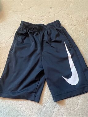 Nike Dark Grey Shorts with White Swoosh Logo